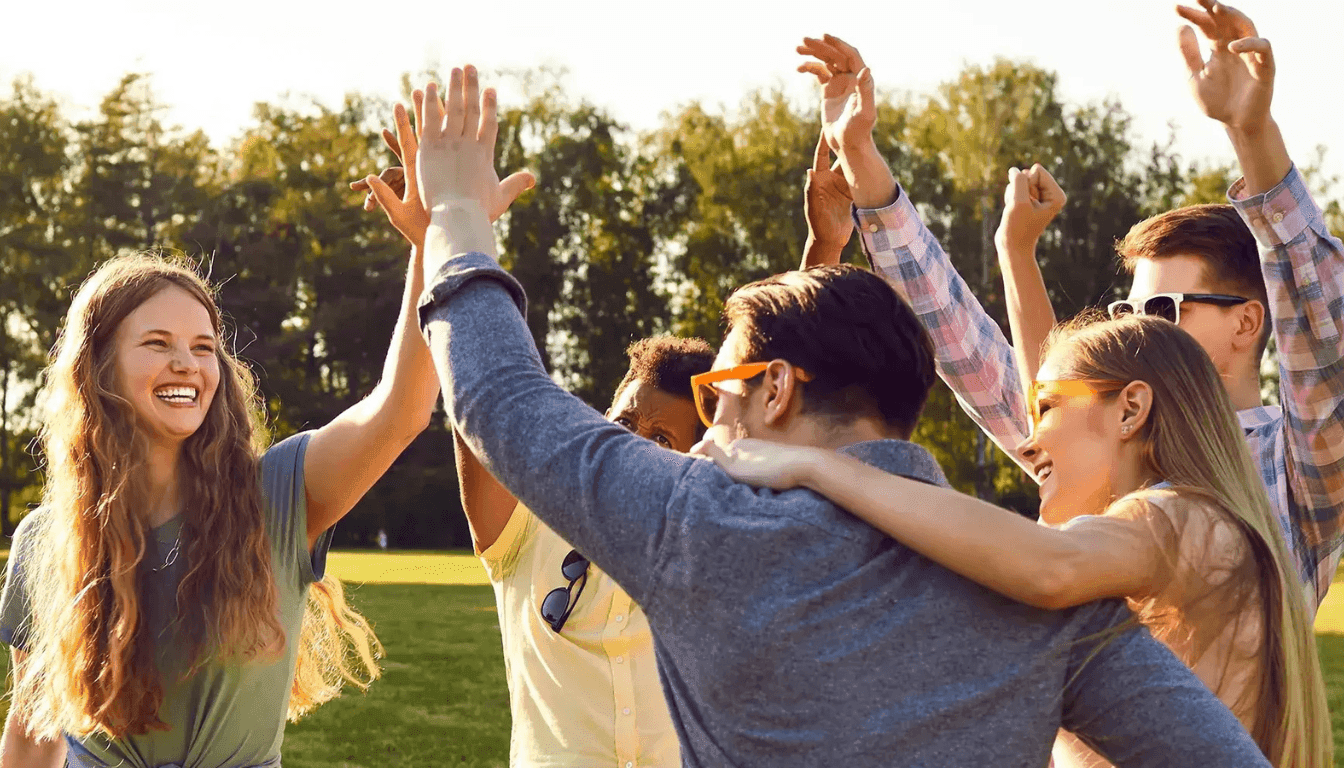 A group celebrating together outdoors