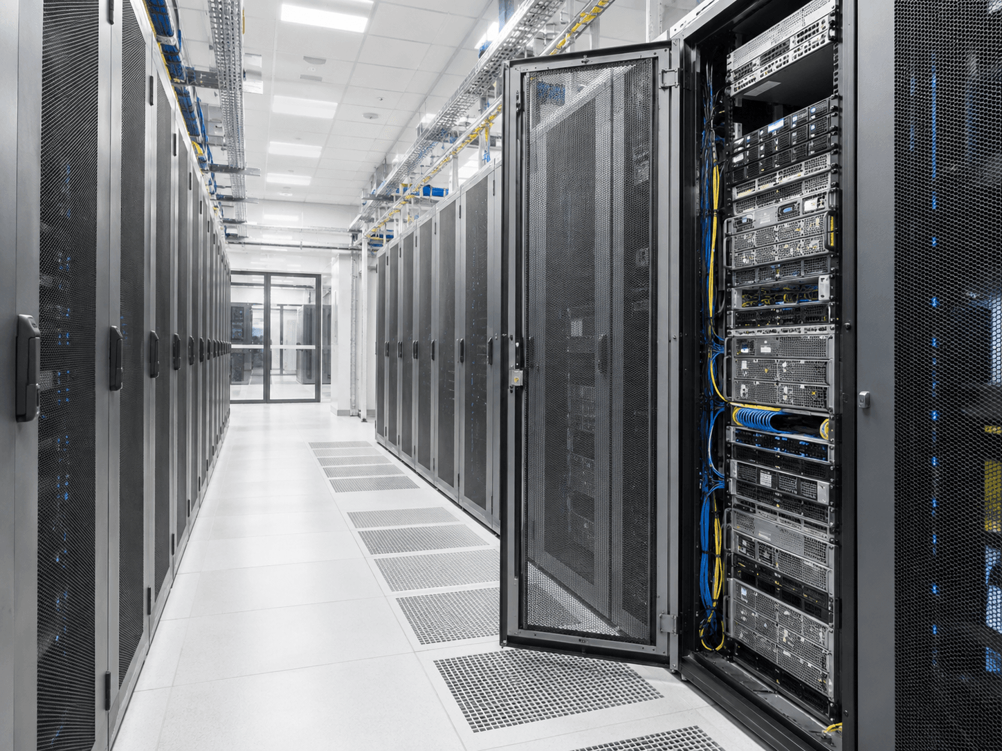 Bright data centre aisle with dedicated server hardware
